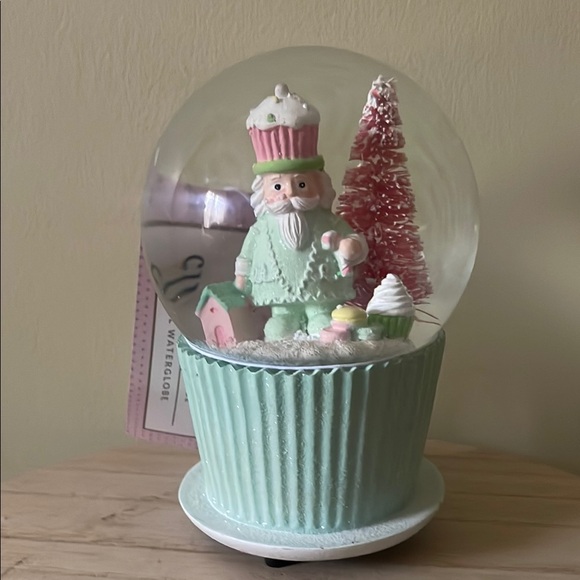 cupcakes & cashmere Other - Pastel Snow Globe with Santa and Tree